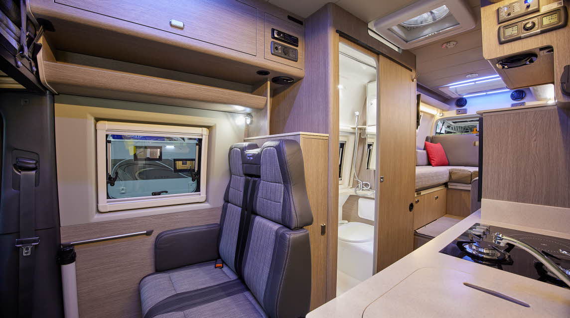 Wooden furniture, grey upholstery, kitchen, rear lounge