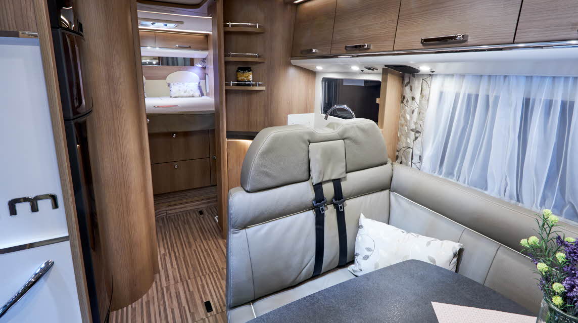 Interior, cream upholstery, wooden cabinets