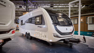 Swift Elegance Grande 850 is white with black decals and grey side panels.  Its corner steadies are down.