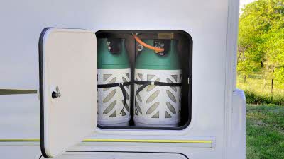 Butane gas canisters in locker