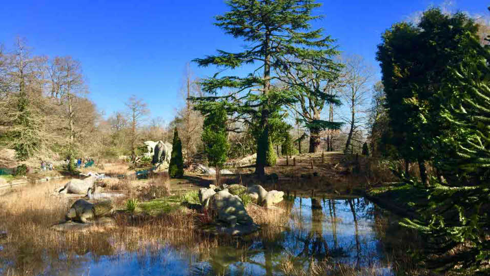 Fake dinosaurs at watering hole at Crystal Palace Park