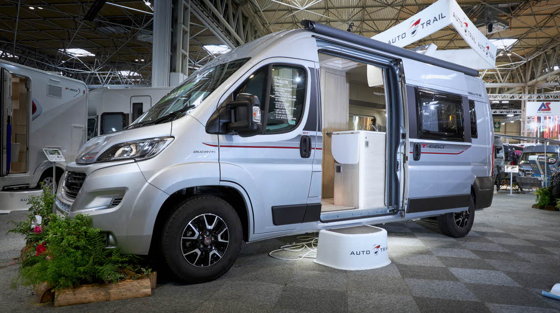 Exterior, white vehicle, fixed roof