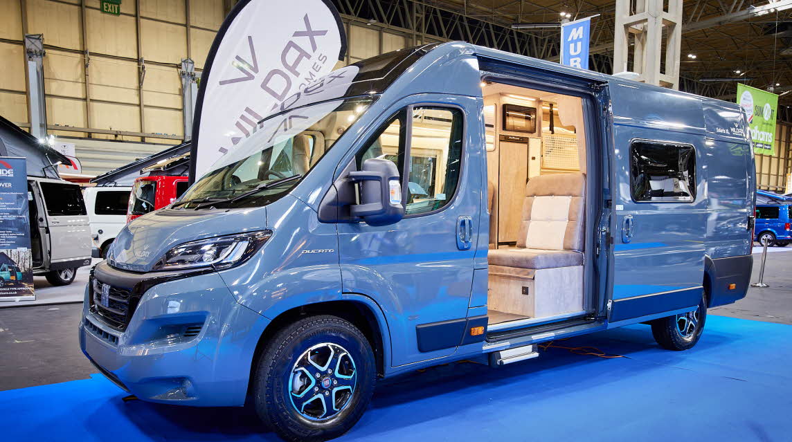 Grey van conversion, sliding door, fixed roof
