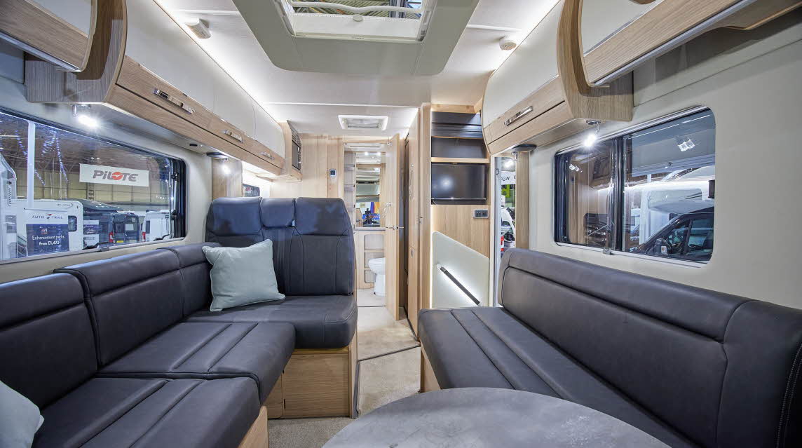 A Class interior, grey upholstery, cream and wood furniture