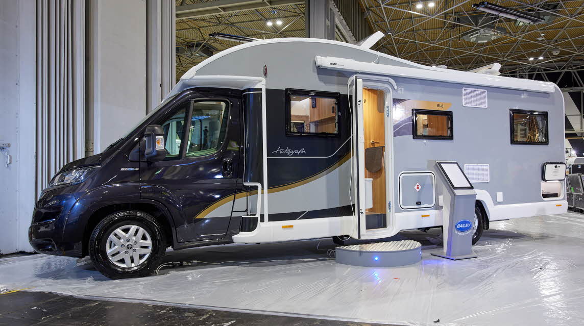 Coachbuilt, dark blue cab, grey body