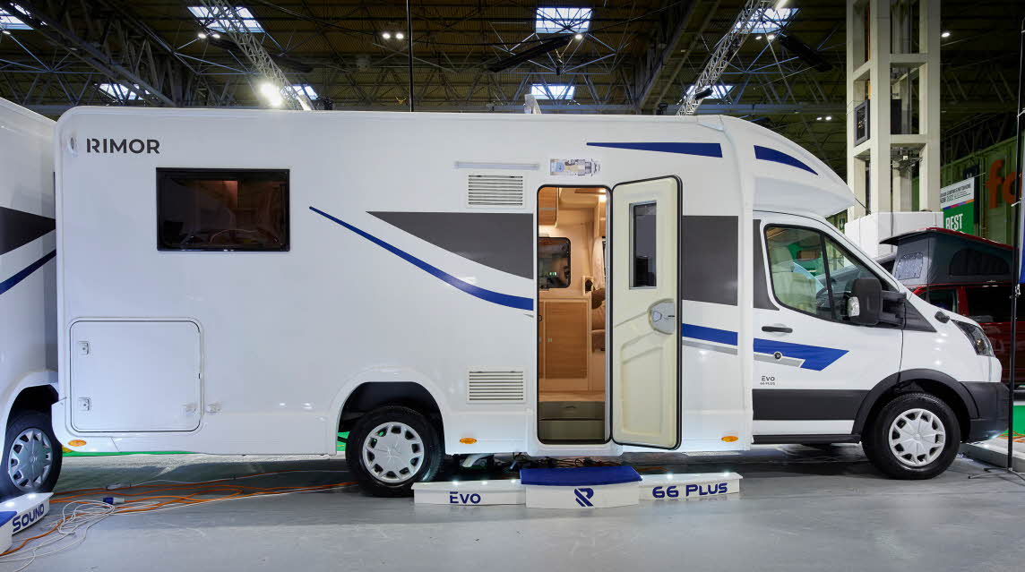 White coachbuilt, blue graphics