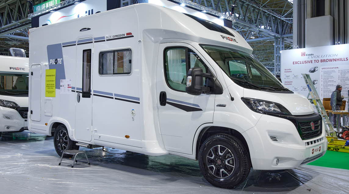 Coachbuilt exterior, white, red graphics