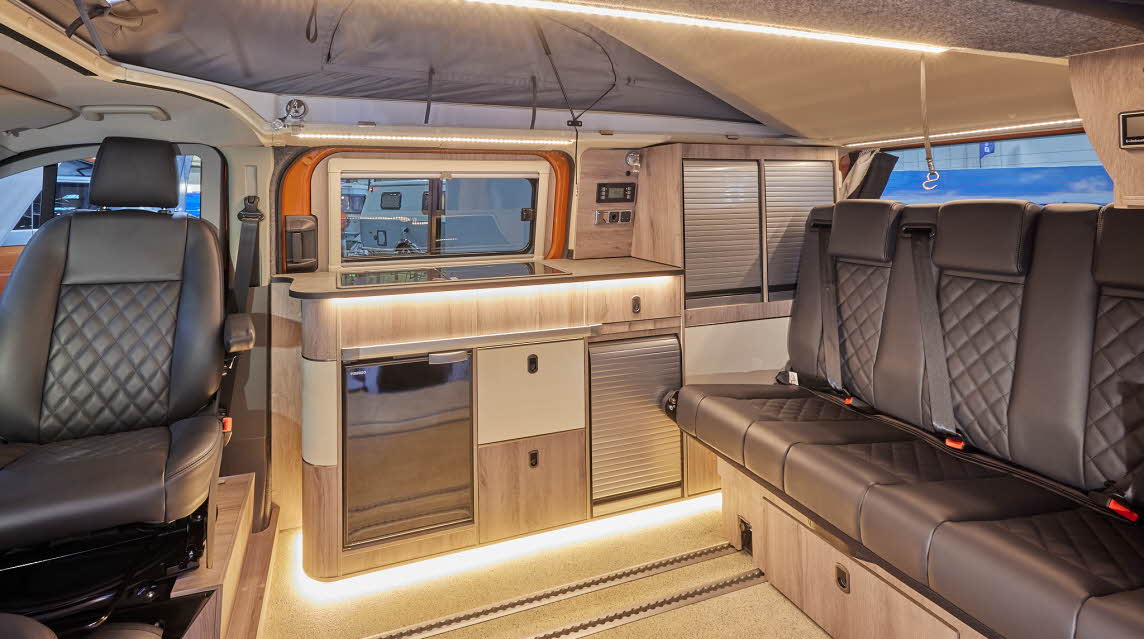 WildAx Proteus has black upholstery; the panelling is wood.  The rear passenger seat unit can be easily move forwards and backwards due to the sliding rail.