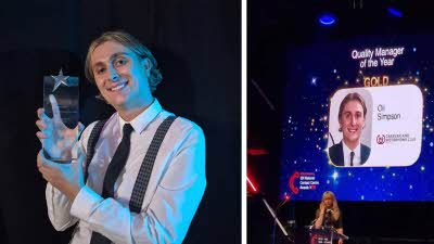 A photo of the contact centre awards 2025 with the CAMC winner, Oli Simpson.